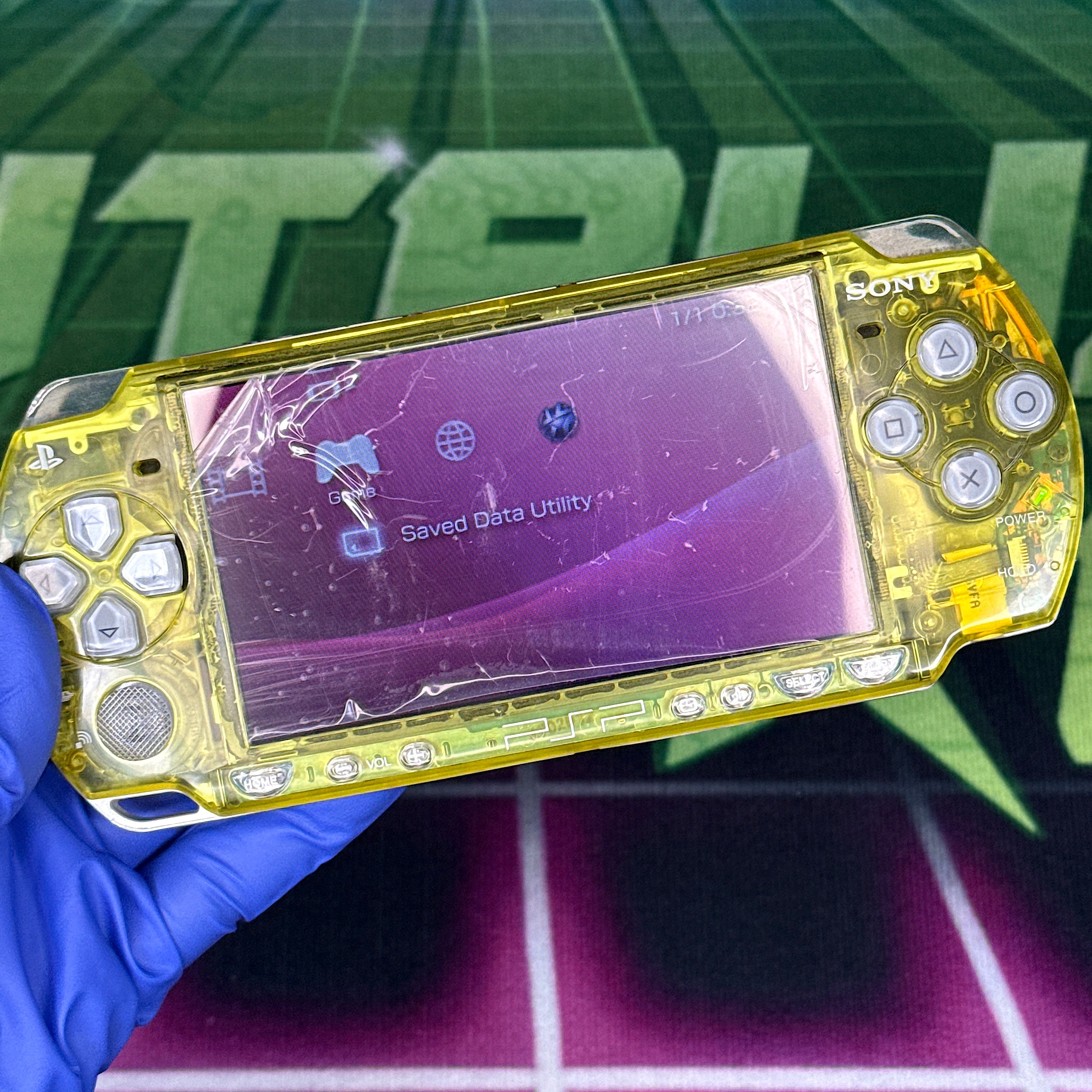 PSP 2000 Handheld Console – Clear Yellow w/ Silver Buttons (Refurbished)