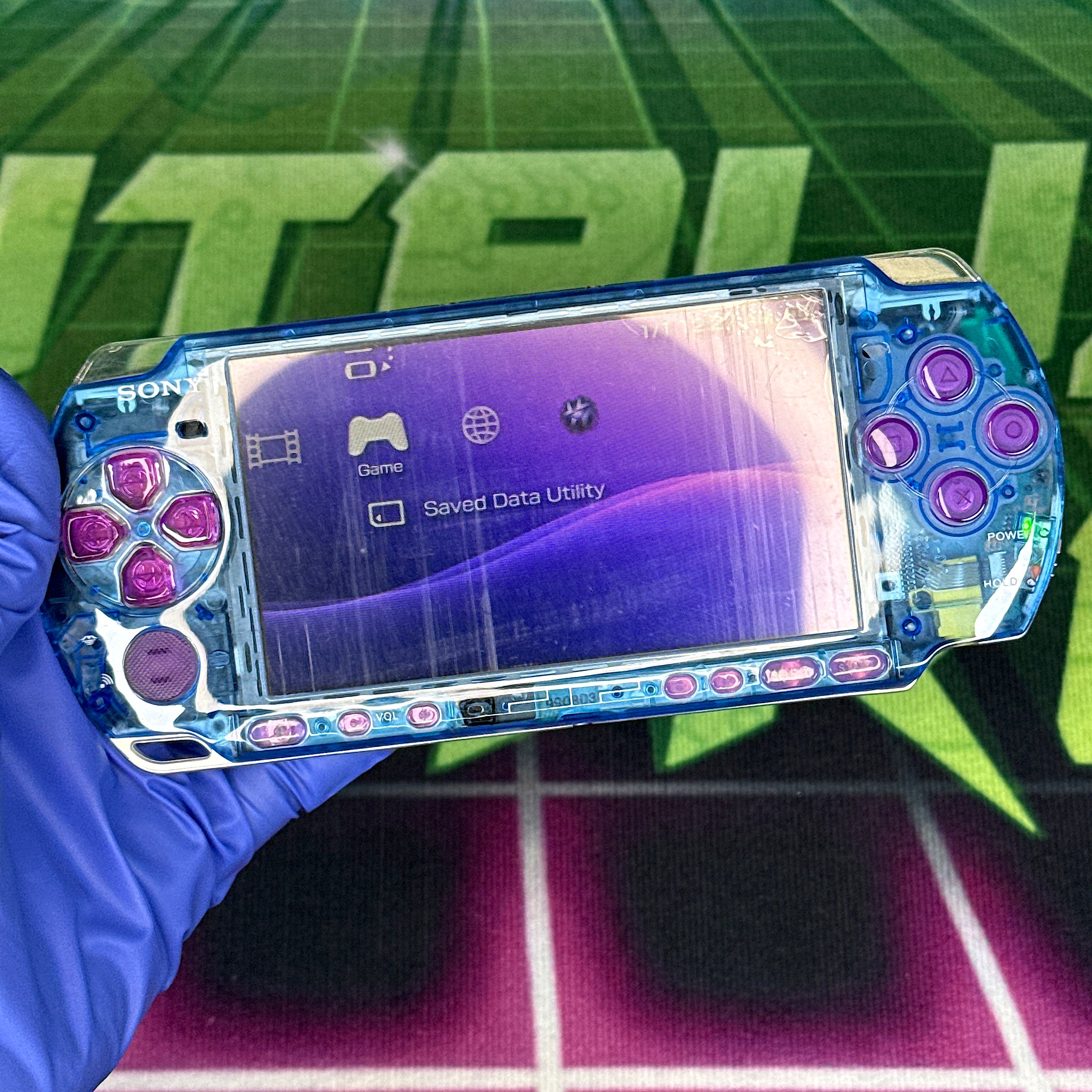 PSP 3000 Handheld Console – Clear Blue w/ Purple Buttons (Refurbished)
