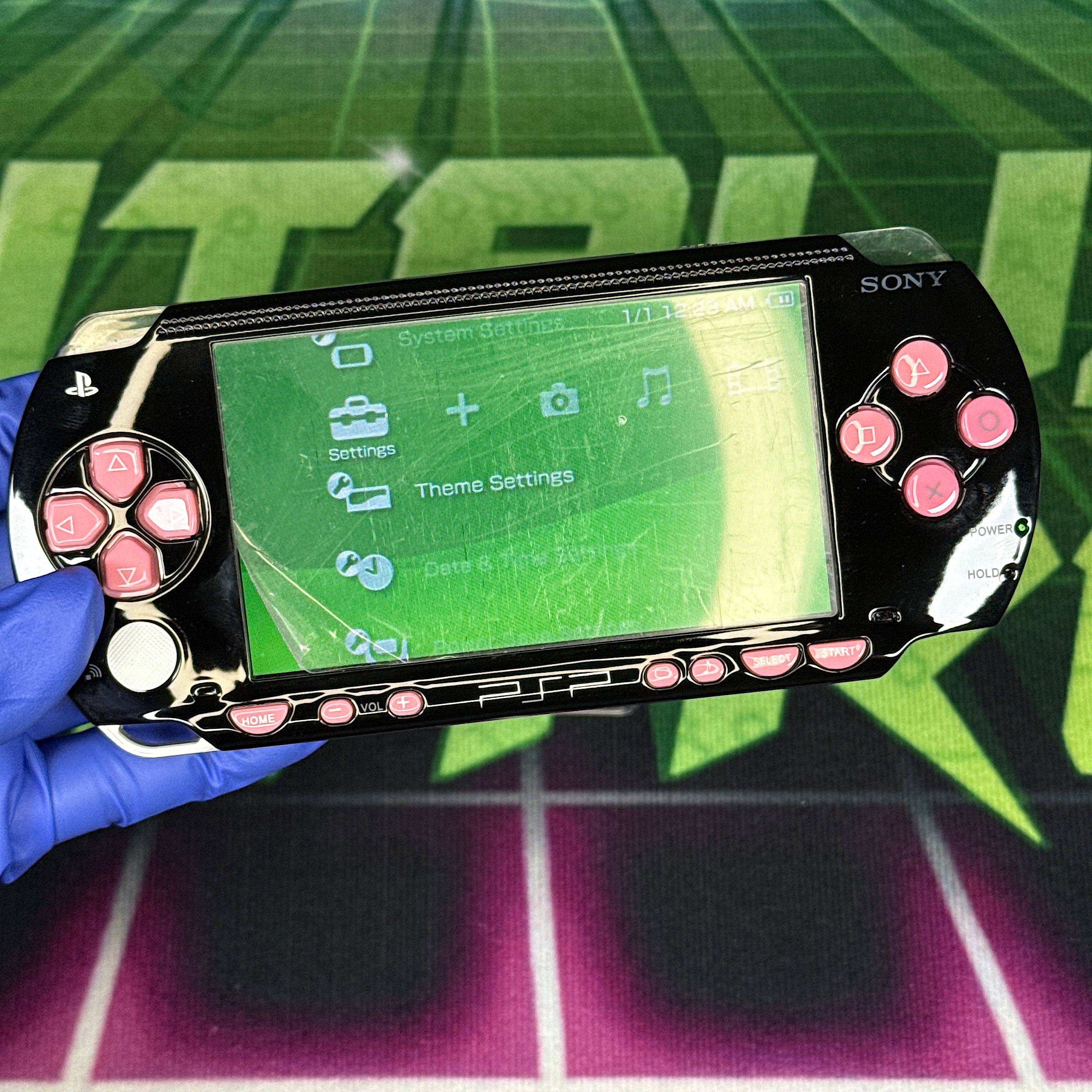 PSP 1000 Handheld Console – Black w/ Pink Buttons (Refurbished)