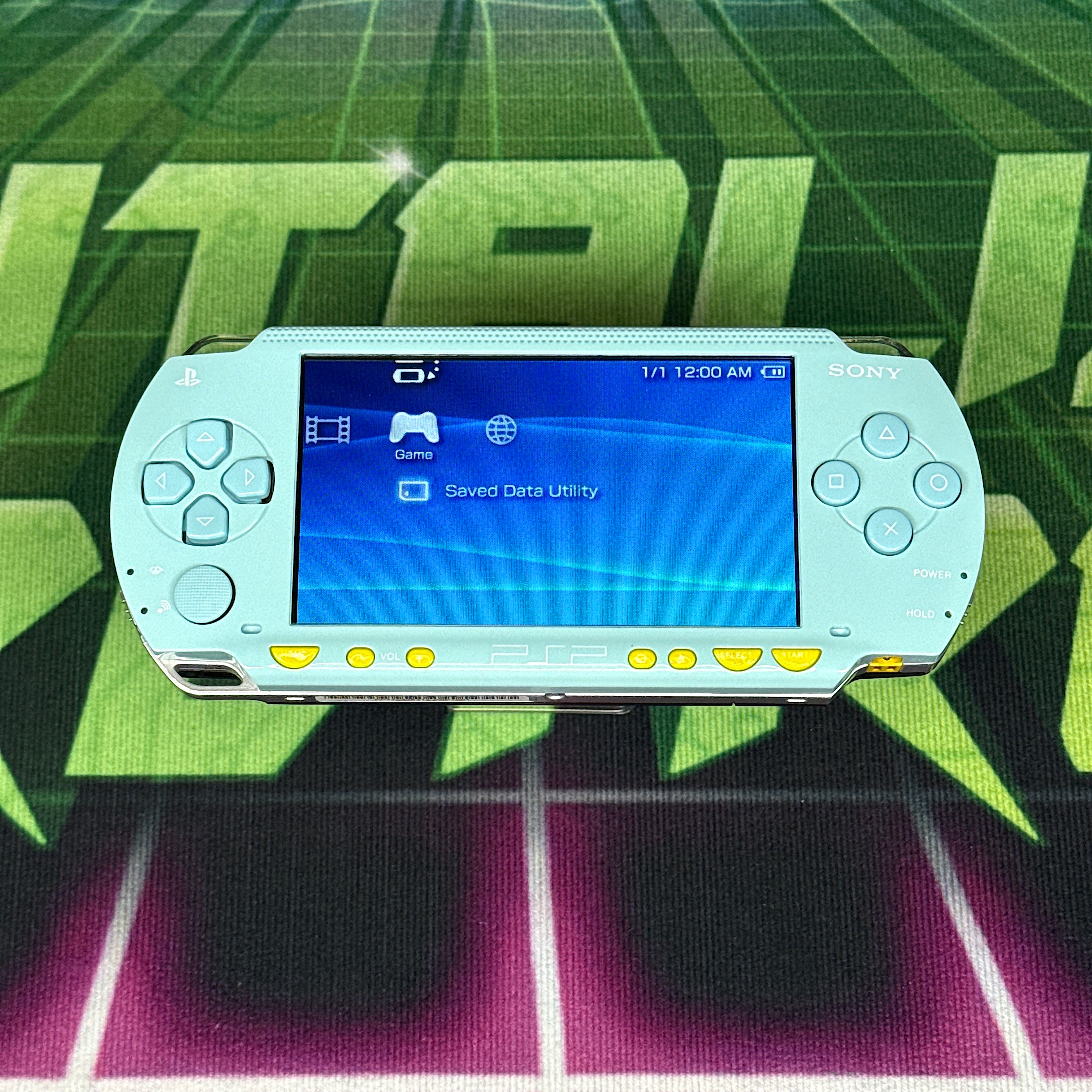 PSP 1000 Handheld Console – Light Blue w/ Yellow Buttons (Refurbished)