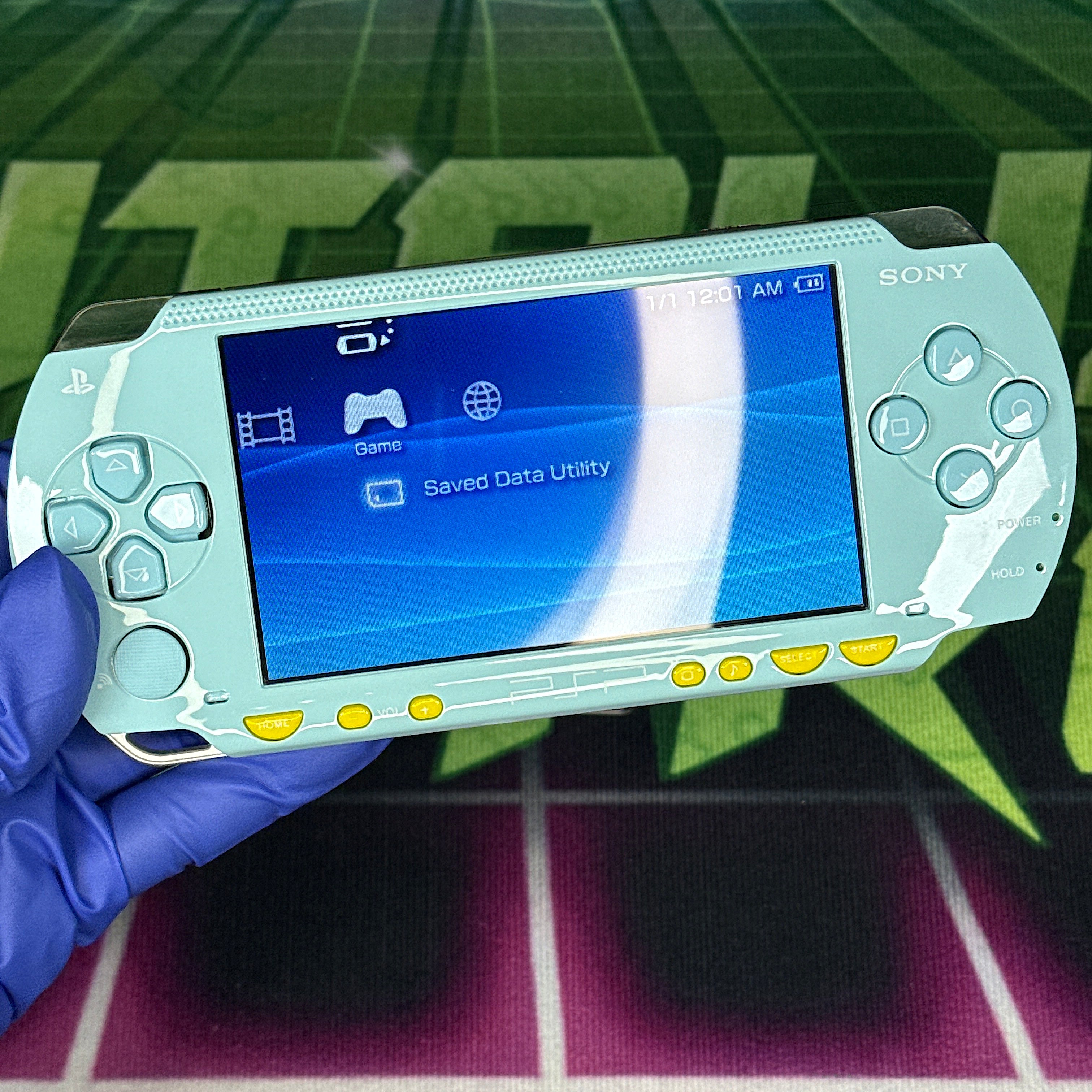 PSP 1000 Handheld Console – Light Blue w/ Yellow Buttons (Refurbished)
