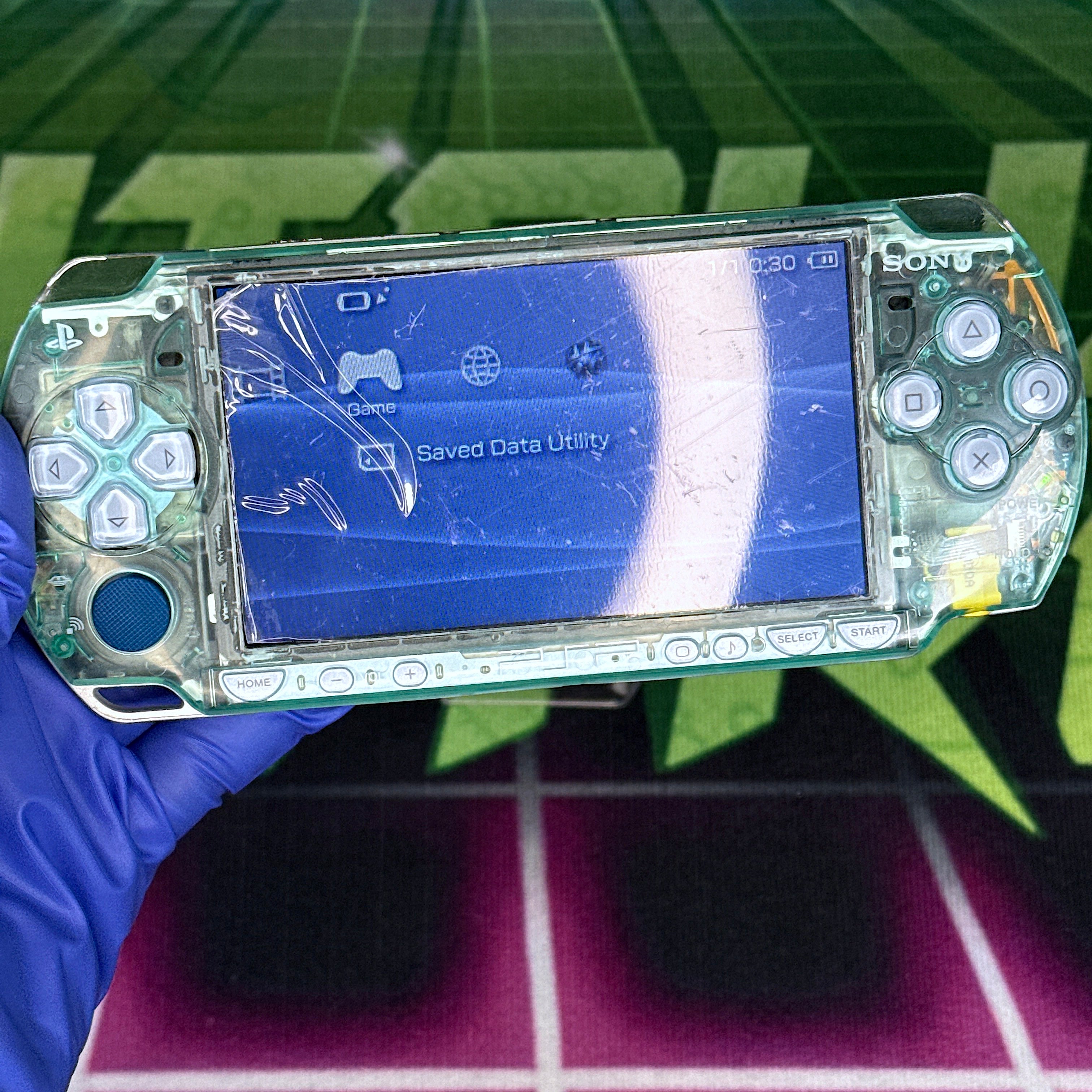 PSP 2000 Handheld Console – Clear Teal w/ Blue Buttons (Refurbished)