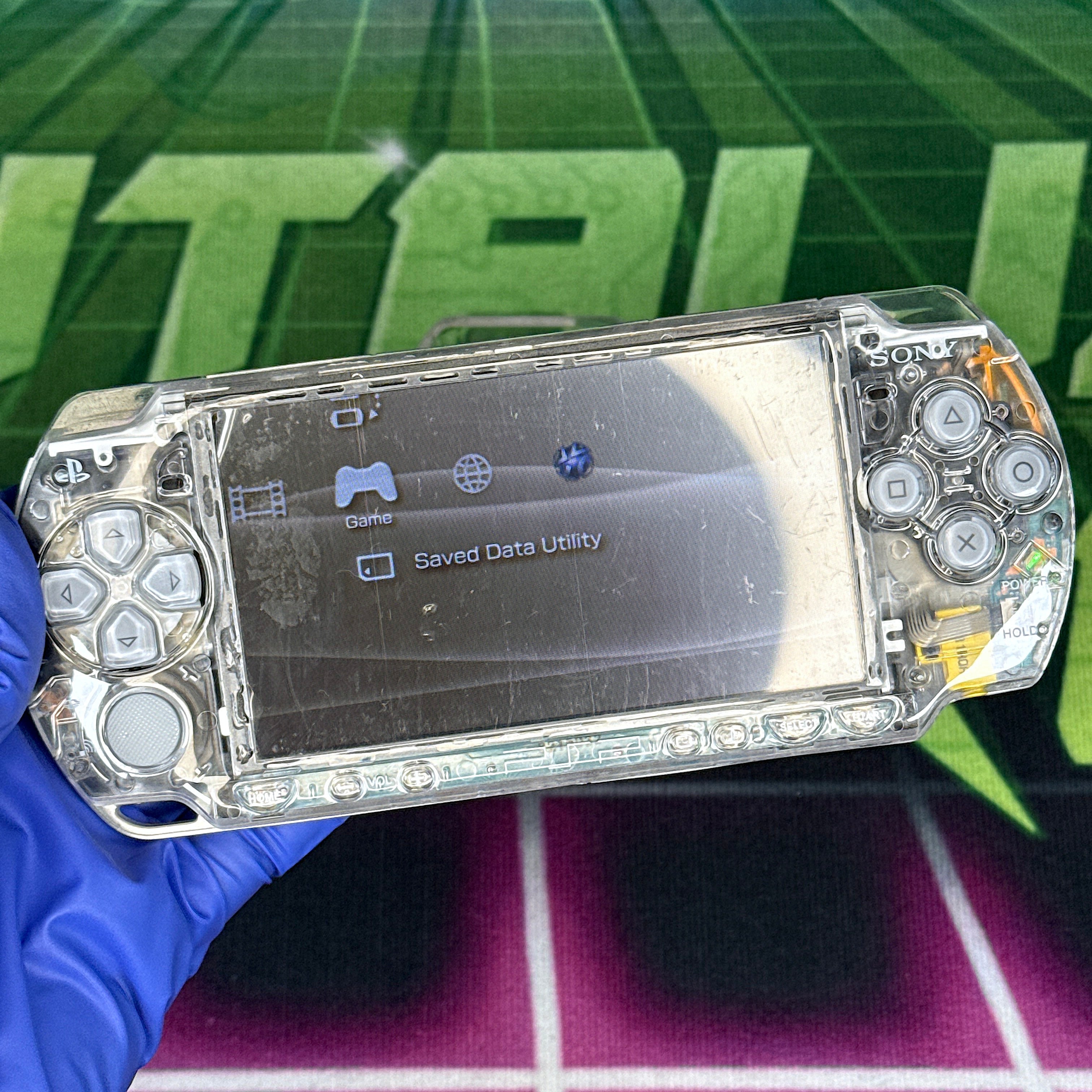 PSP 2000 Handheld Console – Clear w/ Silver Buttons (Refurbished)