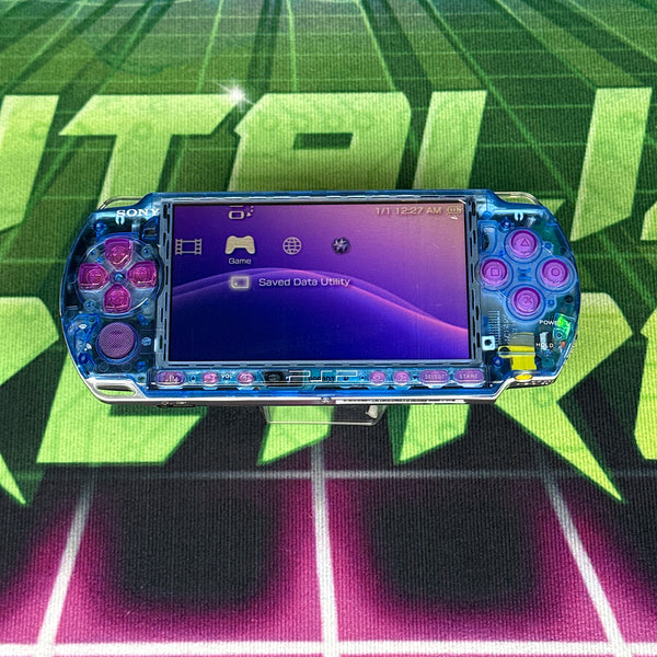 PSP 3000 Handheld Console – Clear Blue w/ Purple Buttons (Refurbished)